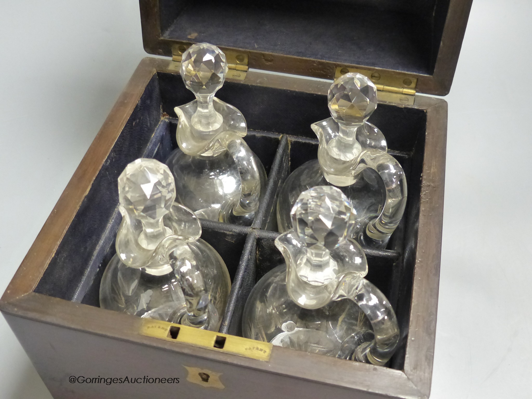 A Victorian rosewood case set of cut glass liqueur decanters, case is 22cm high, width 20cm, depth 20cm